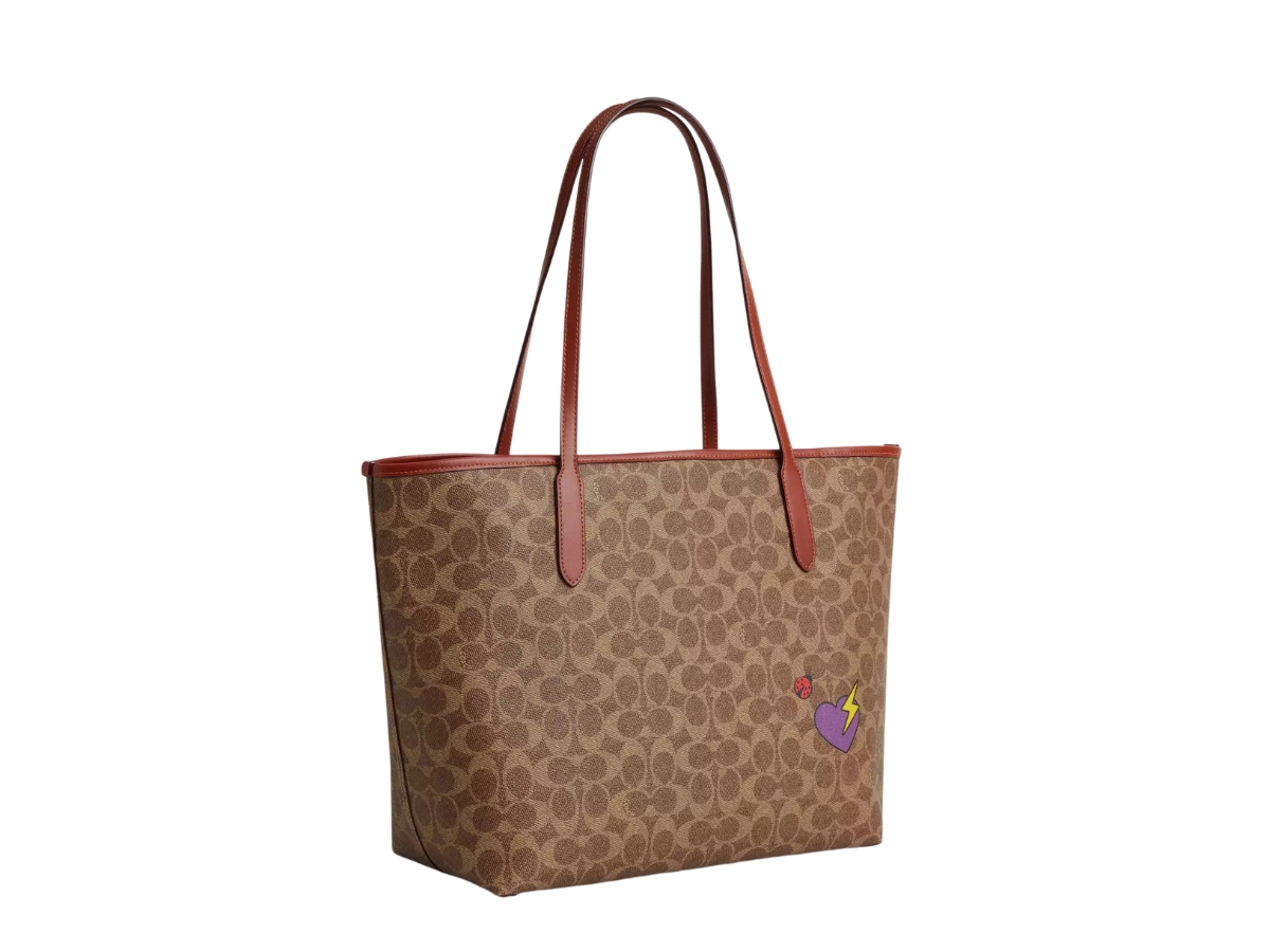 https://d2cva83hdk3bwc.cloudfront.net/coach-city-tote-bag-in-signature-canvas-sticker-print-with-gold-hardware-tan-multi-2.jpg