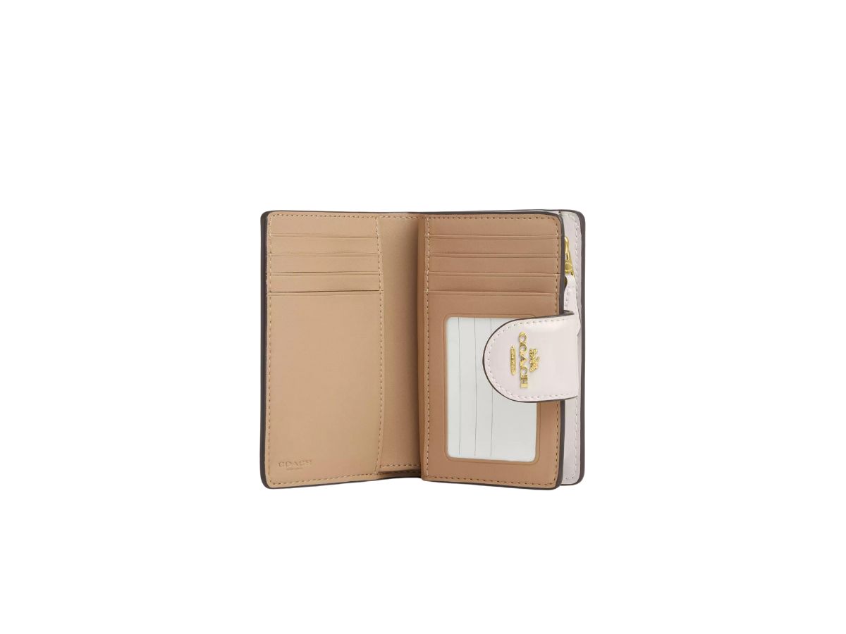 https://d2cva83hdk3bwc.cloudfront.net/coach-medium-corner-zip-wallet-in-signature-leather-with-gold-hardware-chalk-2.jpg