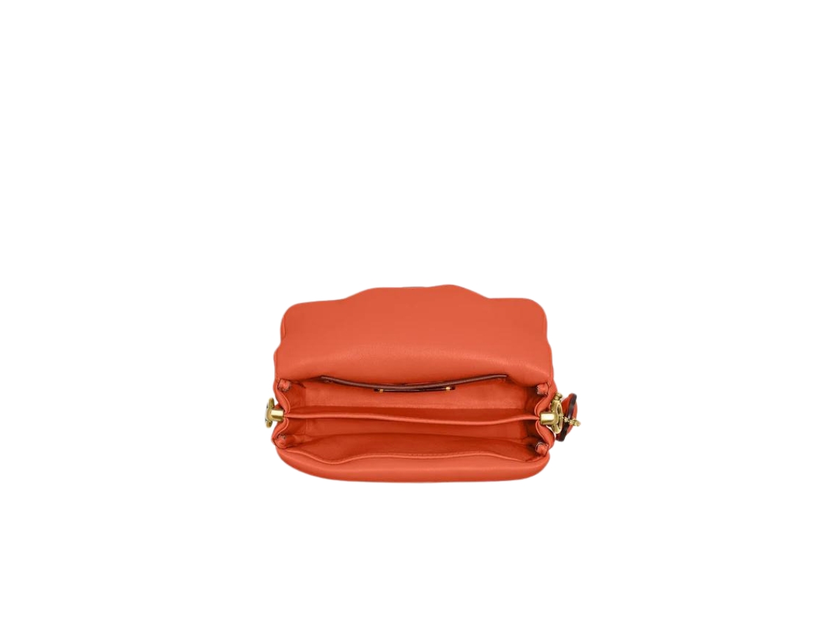 https://d2cva83hdk3bwc.cloudfront.net/coach-pillow-tabby-shoulder-bag-18-in-nappa-leather-with-wrapped-signature-hardware-sun-orange-2.jpg