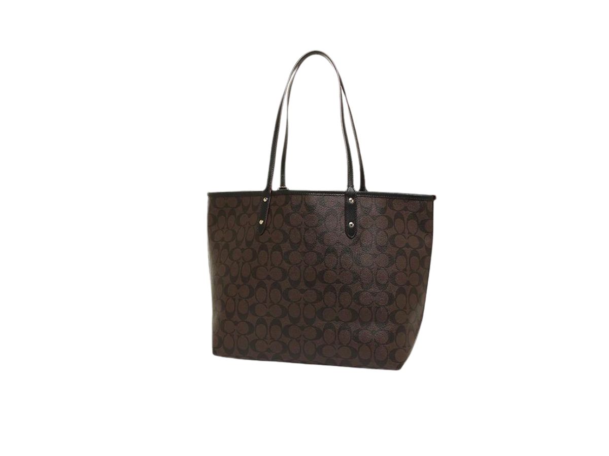https://d2cva83hdk3bwc.cloudfront.net/coach-reversible-city-tote-in-signature-dark-brown-canvas-with-imitation-gold-hardware-3.jpg