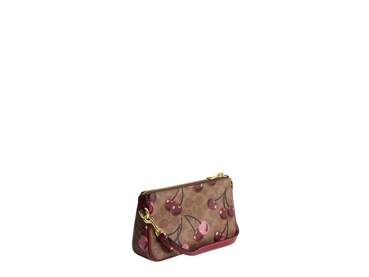 https://d2cva83hdk3bwc.cloudfront.net/cz011-coach-nolita-19-in-signature-canvas-with-cherry-print-tan-3.jpg