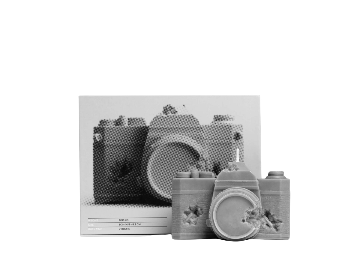 https://d2cva83hdk3bwc.cloudfront.net/daniel-arsham-eroded-camera-candle-grey-5.jpg