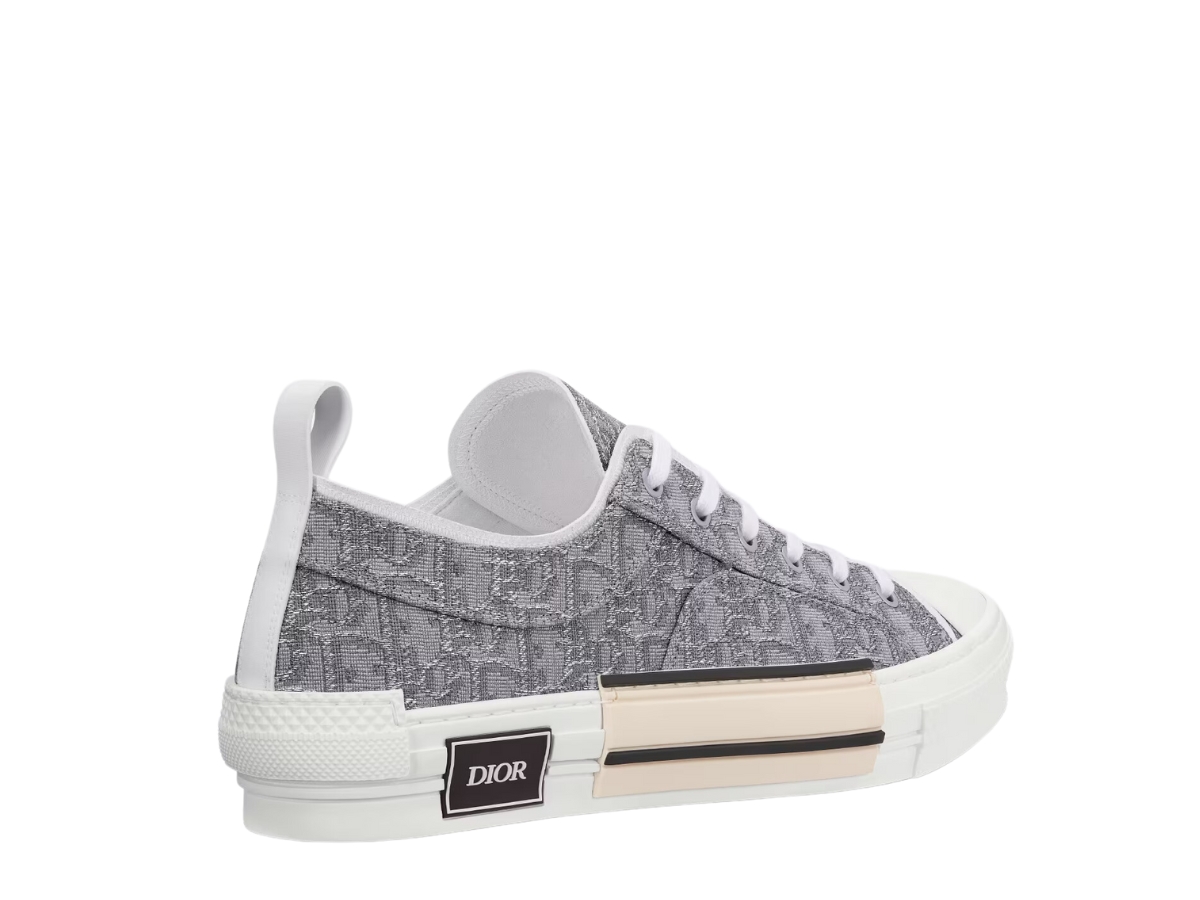 https://d2cva83hdk3bwc.cloudfront.net/dior-b23-low-top-sneaker-ruthenium-colored-dior-oblique-canvas-2.jpg