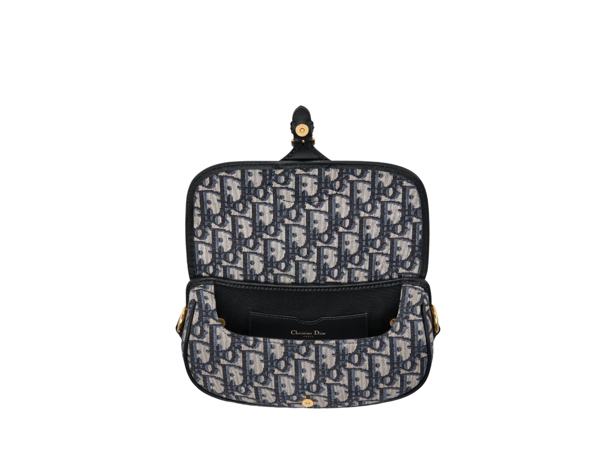 https://d2cva83hdk3bwc.cloudfront.net/dior-bobby-east-west-bag-in-blue-dior-oblique-jacquard-with-gold-finish-metal-hardware-3.jpg