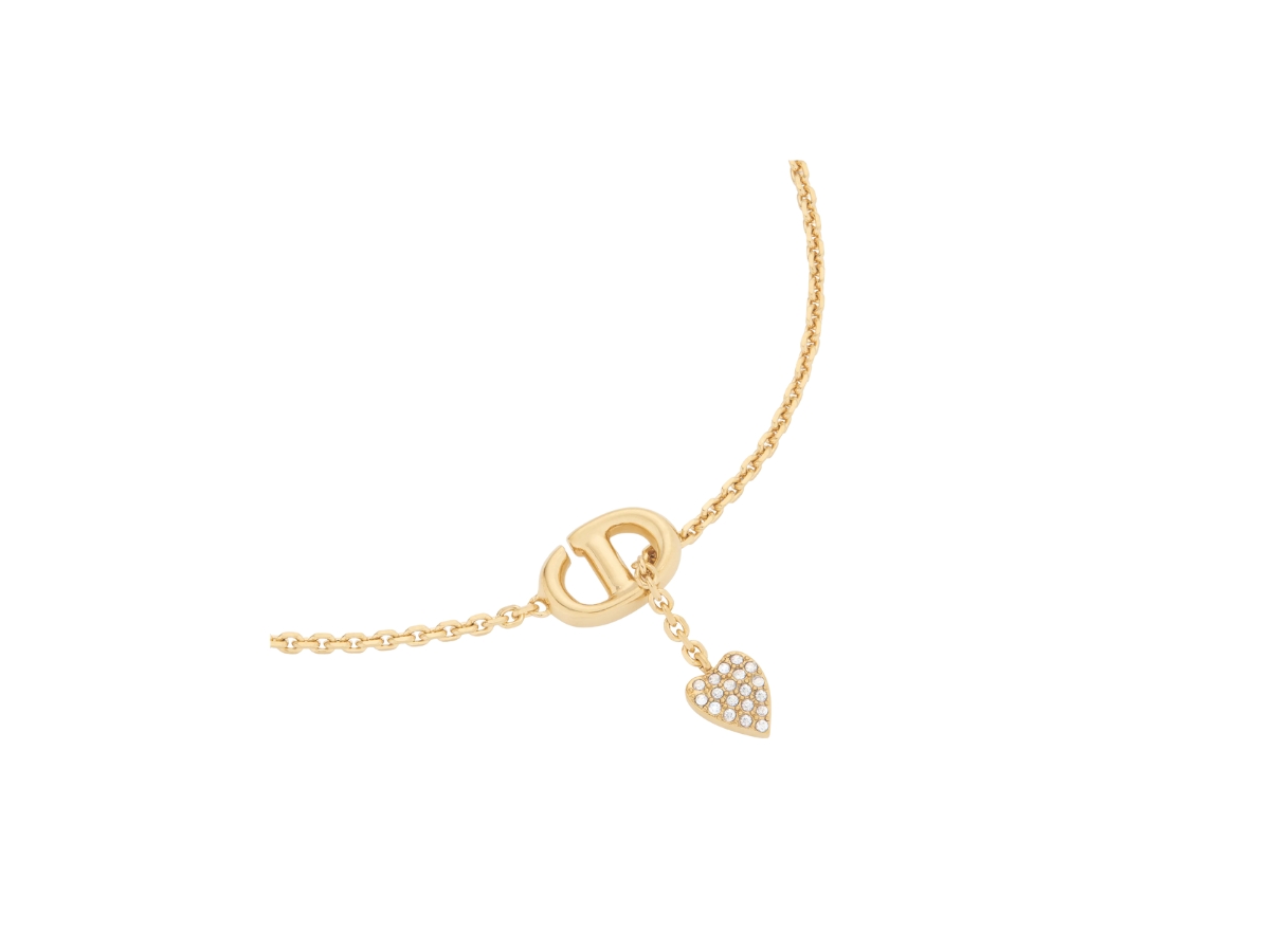 https://d2cva83hdk3bwc.cloudfront.net/dior-cd-navy-bracelet-in-gold-plated-metal-and-silver-tone-crystal-2.jpg