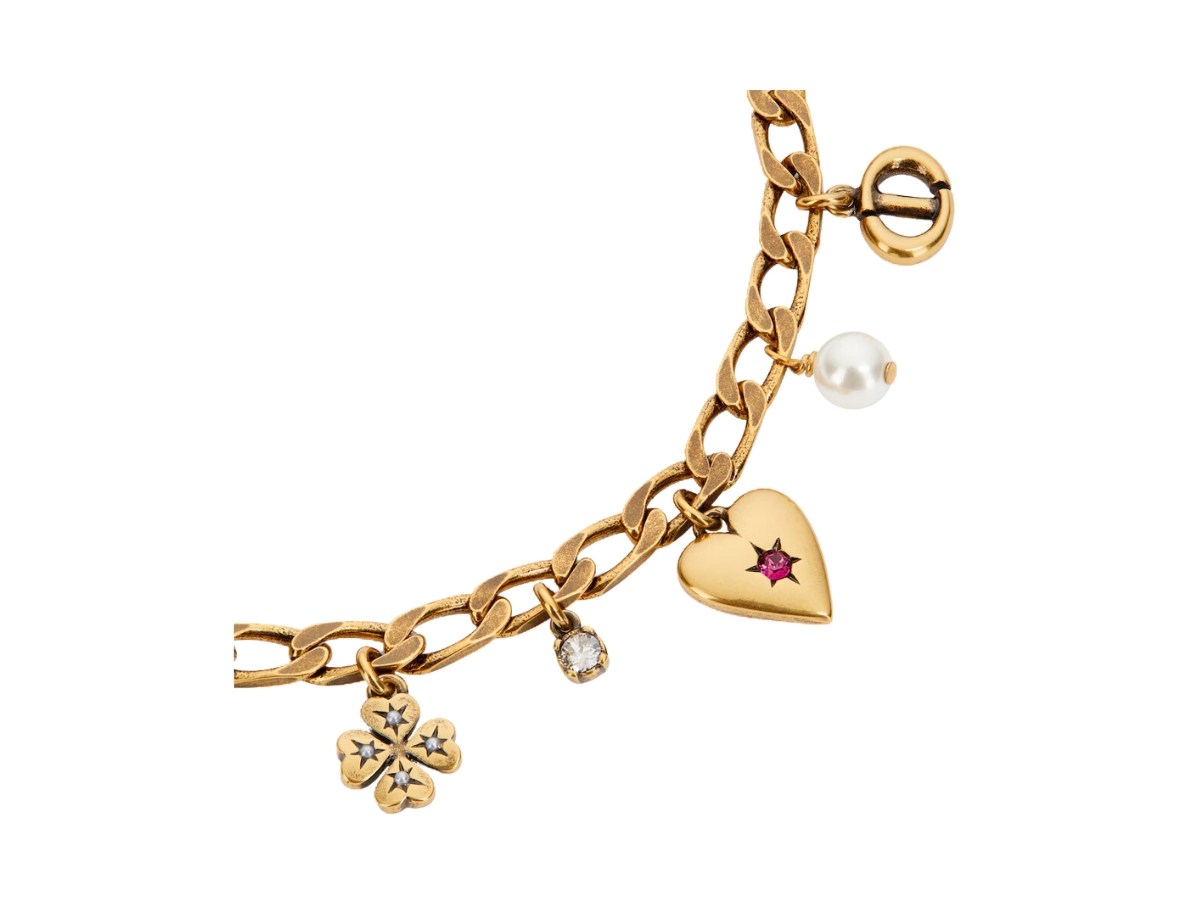 https://d2cva83hdk3bwc.cloudfront.net/dior-lucky-charms-bracelet-in-star-clover-heart-charms-antique-gold-finish-metal-with-white-resin-pearls-and-multicolor-crystals-2.jpg