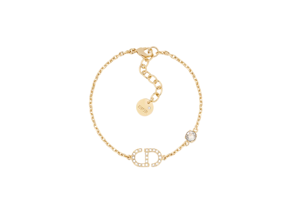 https://d2cva83hdk3bwc.cloudfront.net/dior-petit-cd-bracelet-in-cd-signature-gold-finish-metal-and-silver-tone-crystals-1.jpg