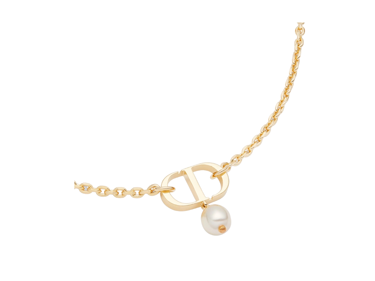 https://d2cva83hdk3bwc.cloudfront.net/dior-petit-cd-necklace-in-gold-finish-metal-with-a-white-resin-pearl-2.jpg