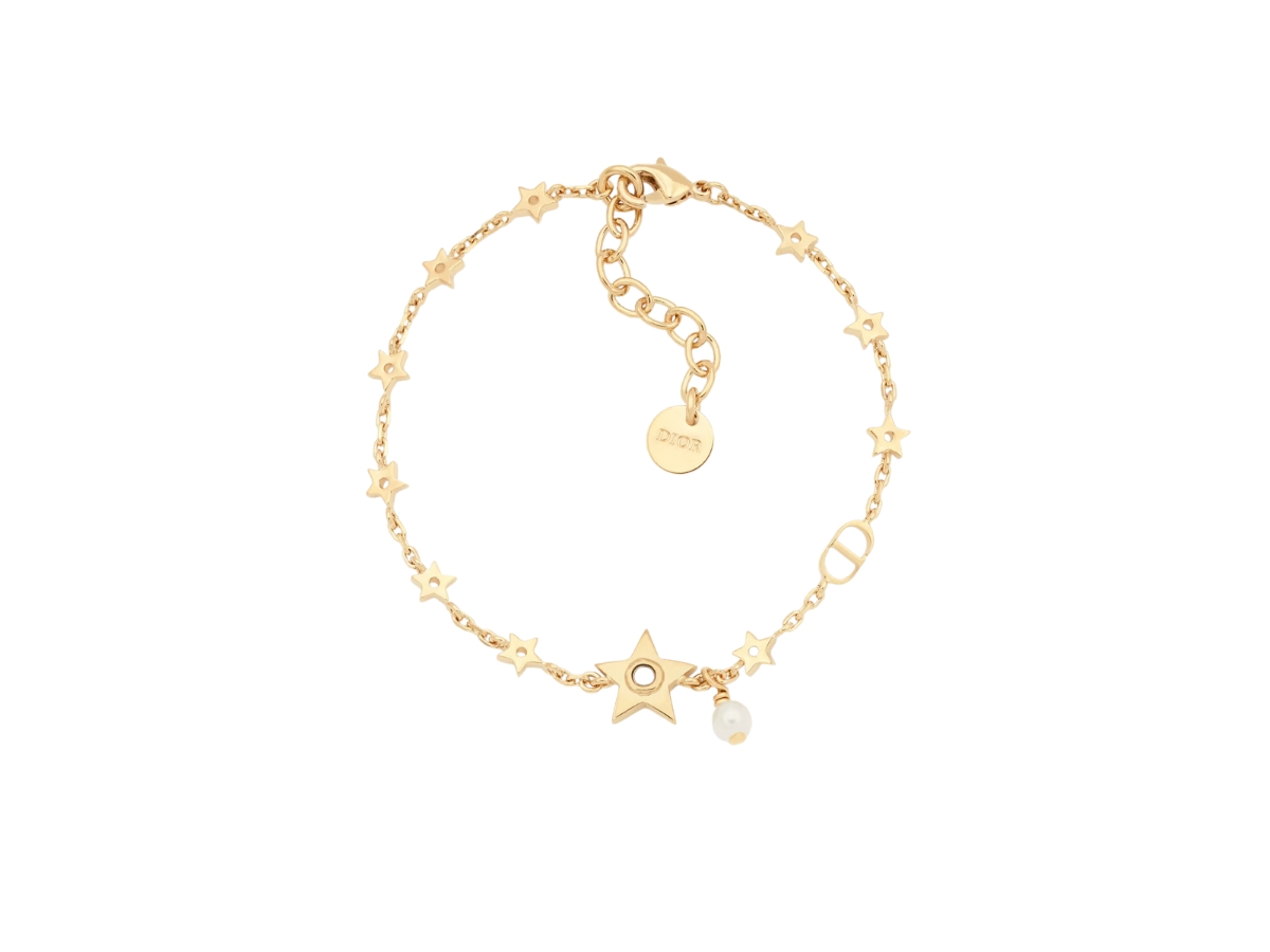 https://d2cva83hdk3bwc.cloudfront.net/dior-star-bracelet-in-star-detail-gold-finish-metal-with-a-white-resin-pearl-and-mirror-1.jpg