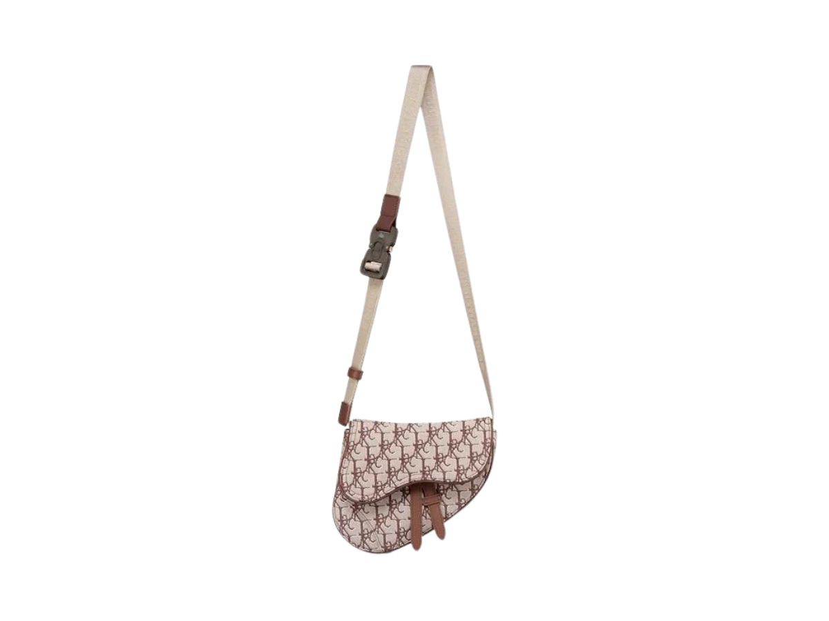 https://d2cva83hdk3bwc.cloudfront.net/dior-x-cactus-jack-mini-saddle-bag-in-coffee-oblique-jacquard-4.jpg