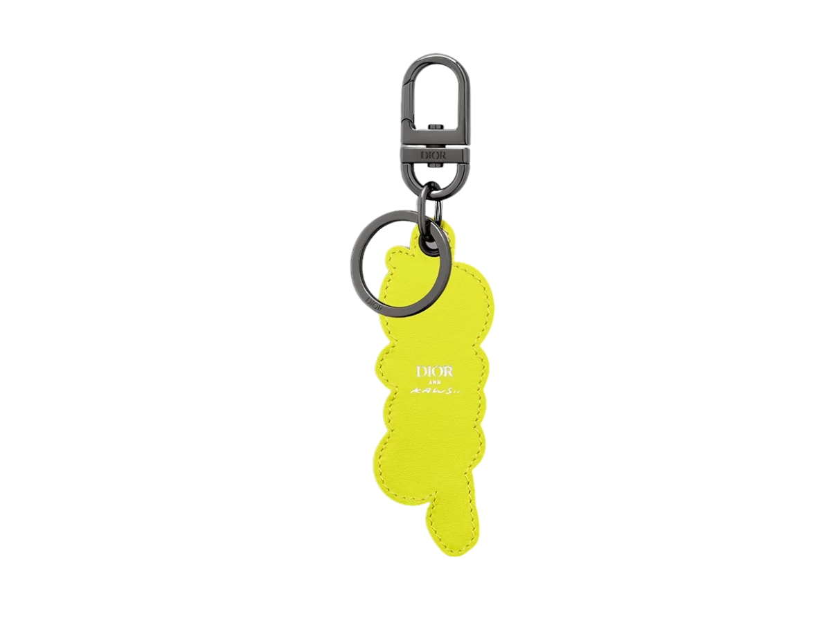 https://d2cva83hdk3bwc.cloudfront.net/dior-x-kaws-key-ring-yellow-grained-calfskin-and-pink-and-yellow-rubber-2.jpg