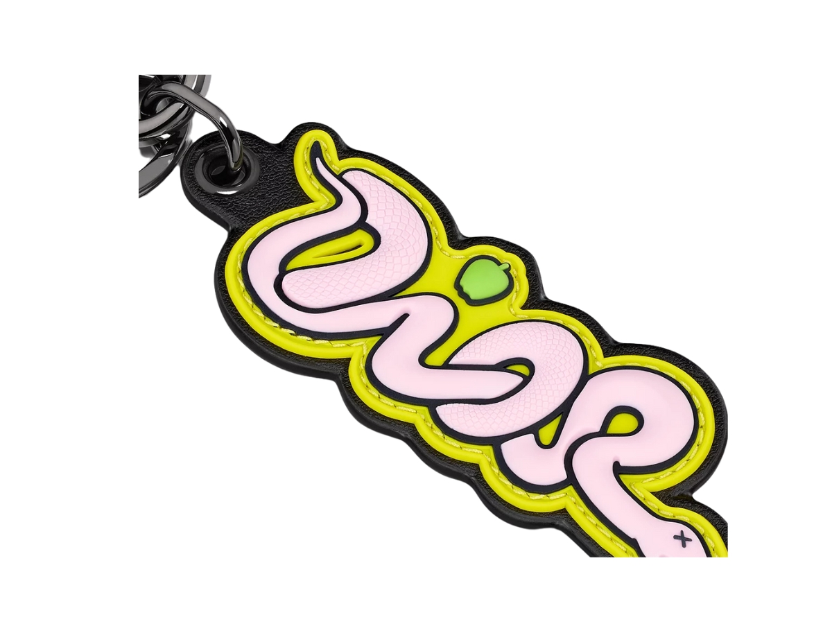https://d2cva83hdk3bwc.cloudfront.net/dior-x-kaws-key-ring-yellow-grained-calfskin-and-pink-and-yellow-rubber-3.jpg
