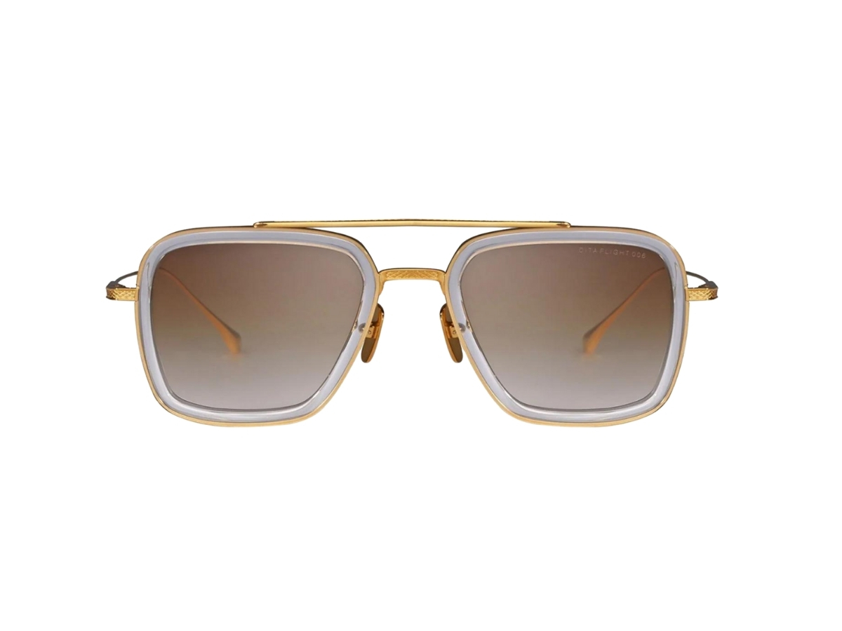 https://d2cva83hdk3bwc.cloudfront.net/dita-flight-006-in-clear-crystal-yellow-gold-titanium-frame-with-brown-to-clear-gradient-lenses-2.jpg