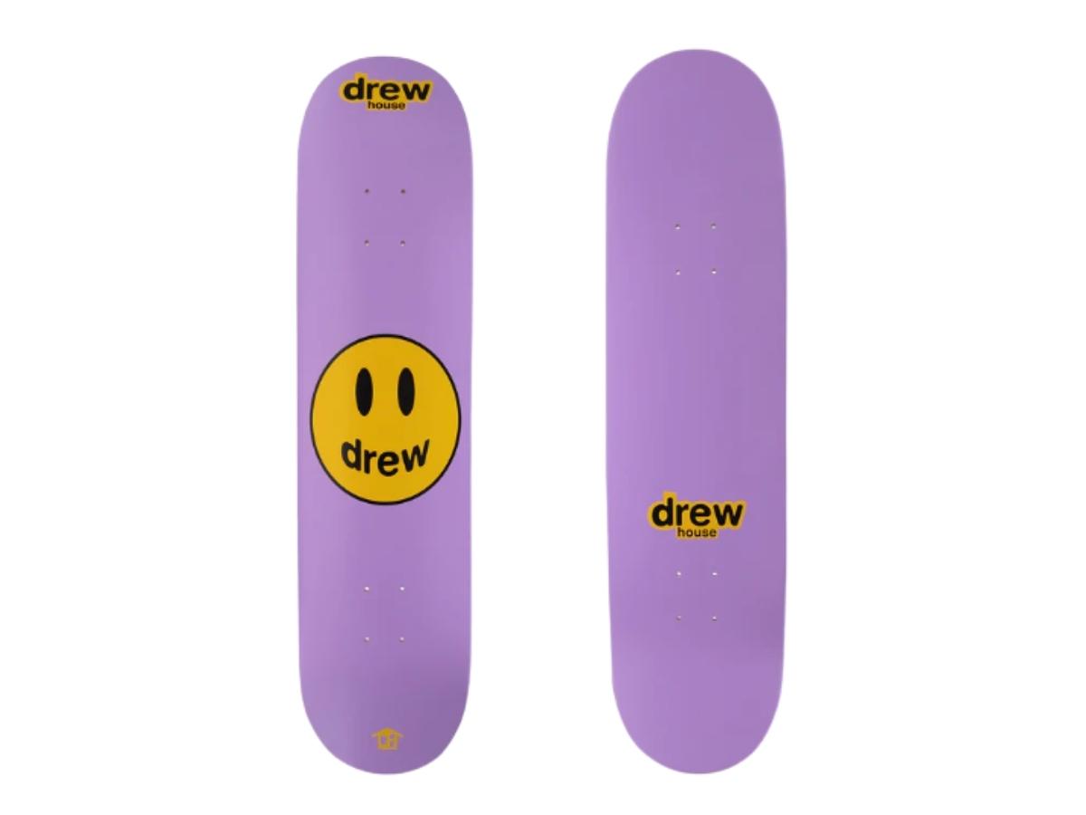 https://d2cva83hdk3bwc.cloudfront.net/drew-house-mascot-skatedeck-lavender-1.jpg