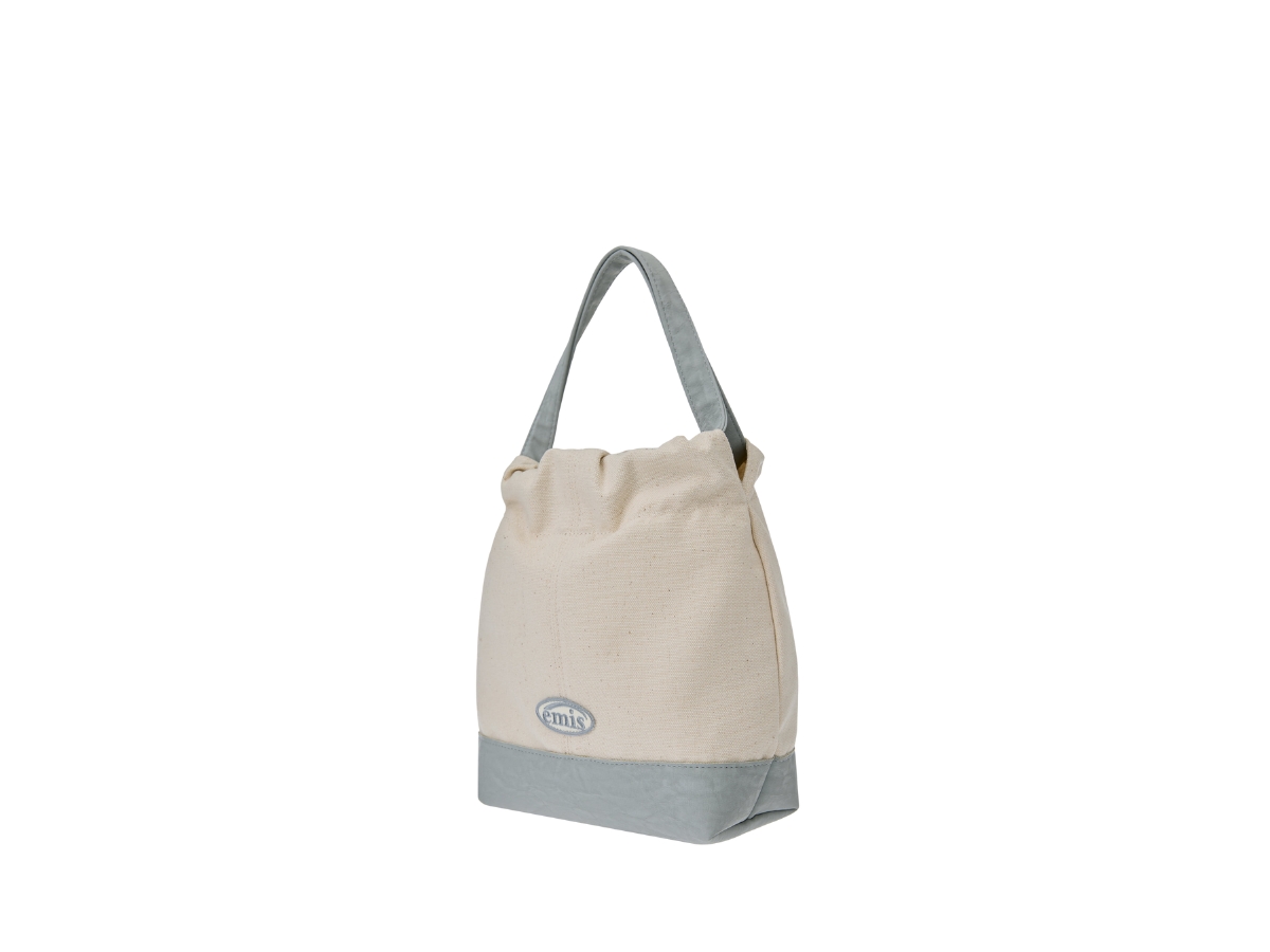 https://d2cva83hdk3bwc.cloudfront.net/emis-canvas-tote-bucket-bag-blue-2.jpg
