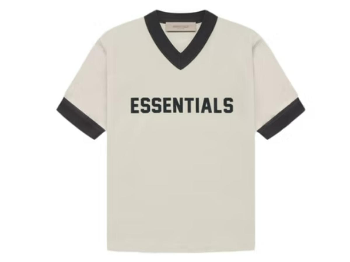 https://d2cva83hdk3bwc.cloudfront.net/fear-of-god-essentials-kids-v-neck-t-shirt-wheat-1.jpg