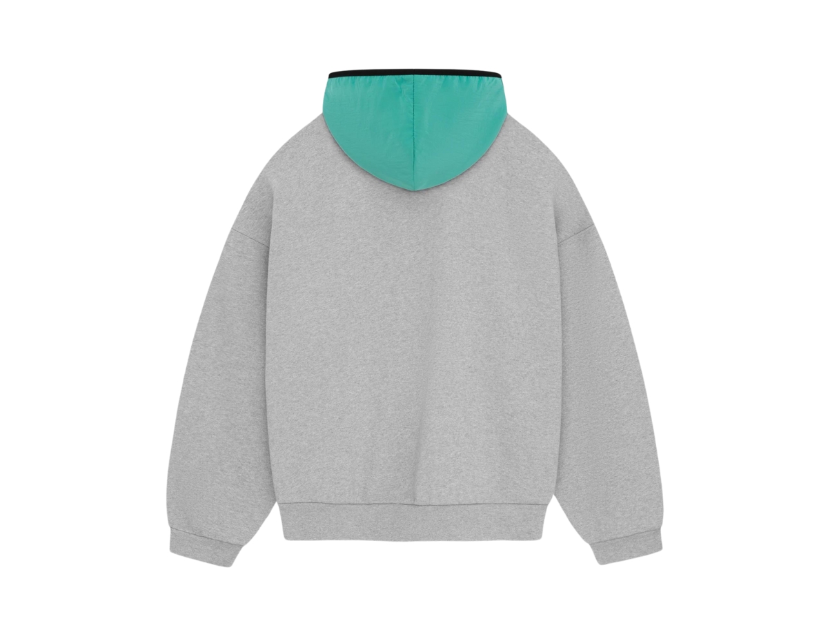 https://d2cva83hdk3bwc.cloudfront.net/fear-of-god-essentials-nylon-fleece-hoodie-light-heather-grey-mint-leaf--sp24--2.jpg