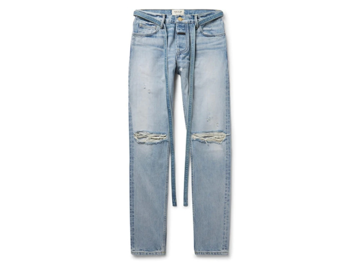 https://d2cva83hdk3bwc.cloudfront.net/fear-of-god-slim-fit-distressed-denim-jeans-indigo-1.jpg