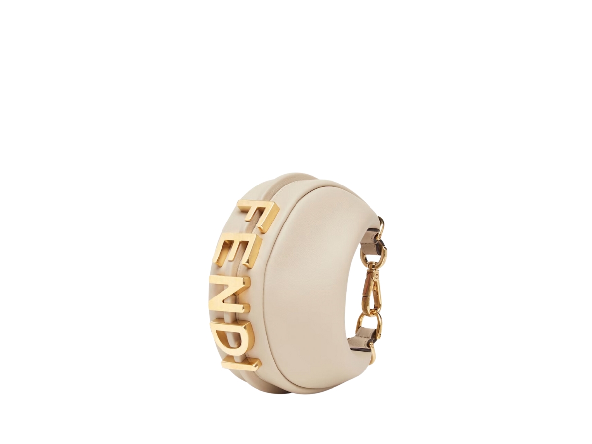 https://d2cva83hdk3bwc.cloudfront.net/fendi-nano-fendigraphy-in-beige-leather-charm-with-gold-finish-metalware-1.jpg