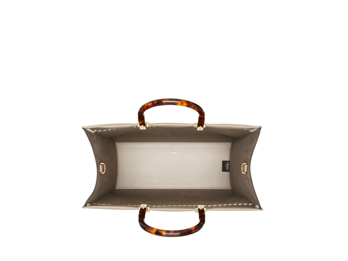 https://d2cva83hdk3bwc.cloudfront.net/fendi-sunshine-medium-shopper-bag-in-dove-grey-leather-with-gold-finish-metalware-2.jpg