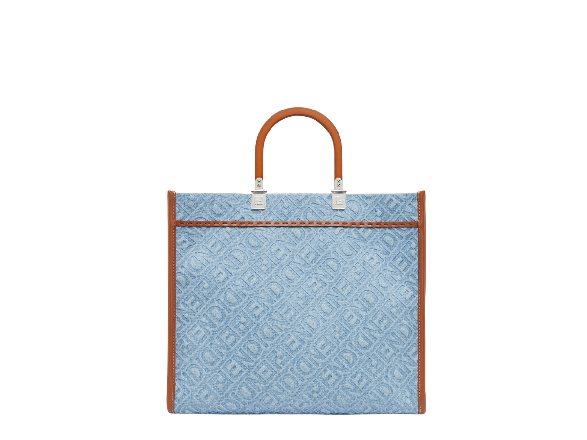 https://d2cva83hdk3bwc.cloudfront.net/fendi-sunshine-medium-shopper-bag-in-light-blue-denim-with-gold-finish-metalware-3.jpg