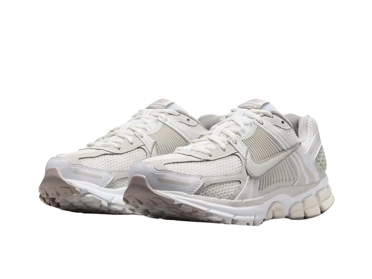 https://d2cva83hdk3bwc.cloudfront.net/fj2028-107-nike-zoom-vomero-5-light-bone-women-s-3.jpg