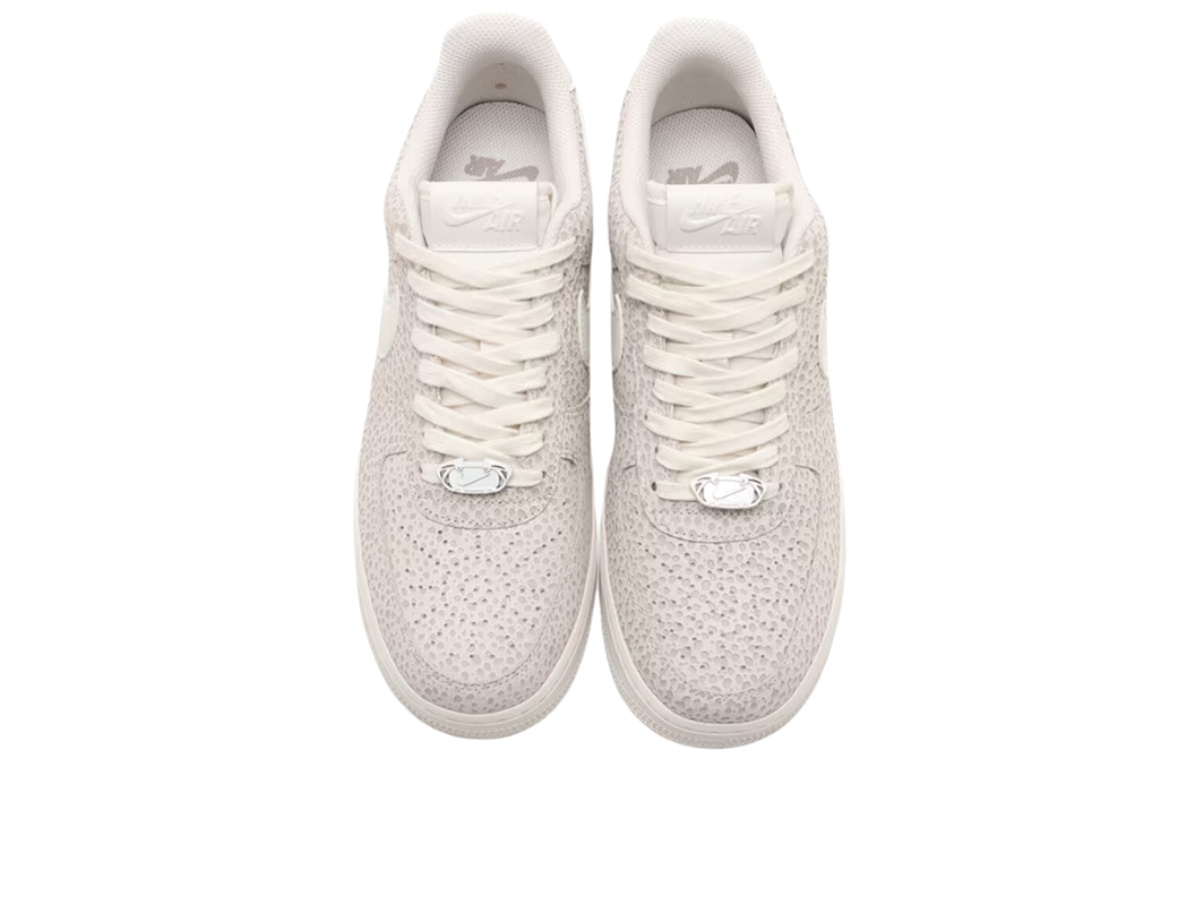 https://d2cva83hdk3bwc.cloudfront.net/fv6519-001-nike-air-force-1-low-07-prm-safari-photon-dust-women-s-3.jpg