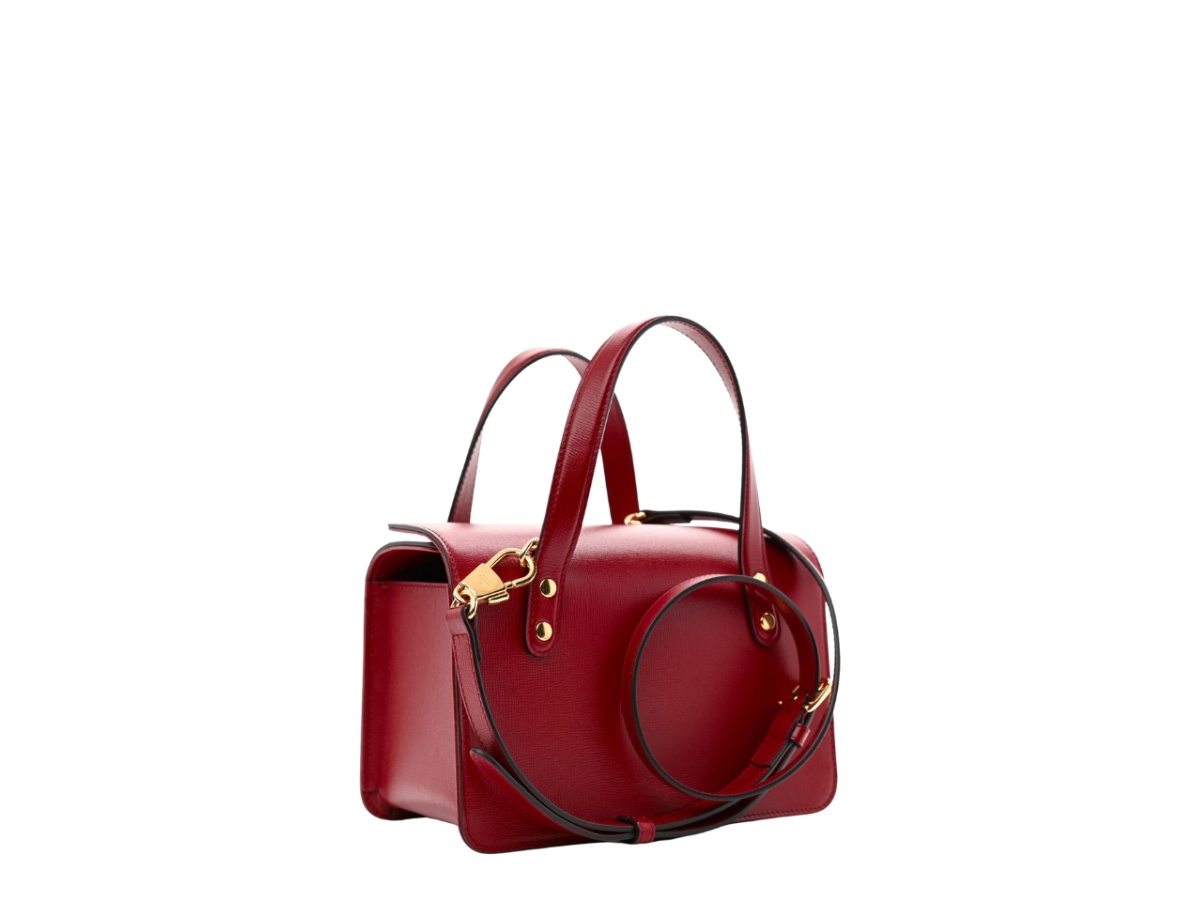 https://d2cva83hdk3bwc.cloudfront.net/gc-habbgmh1fthbitcwghr-gucci-mini-horsebit-1955-foldover-top-handle-bag-in-textured-calfskin-with-gold-hardware-red-2.jpg