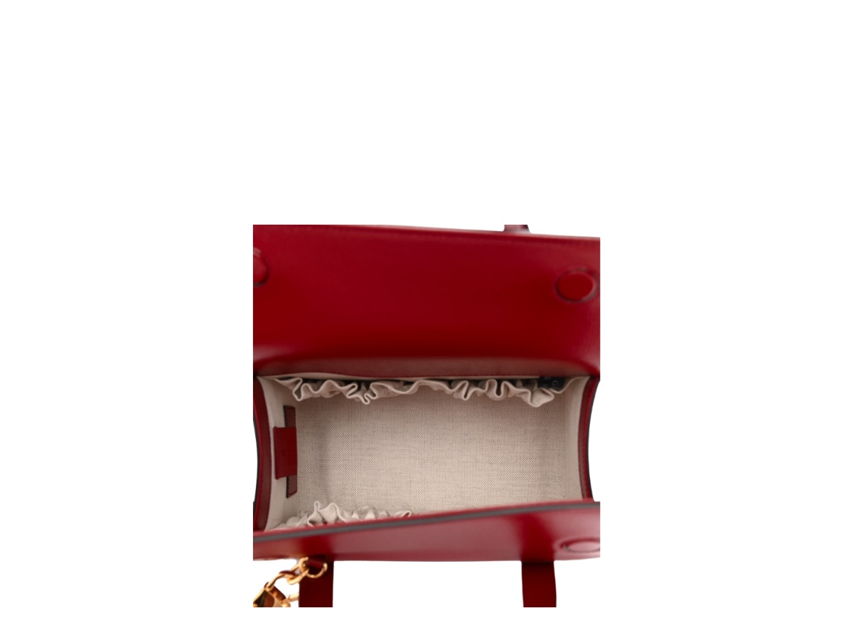 https://d2cva83hdk3bwc.cloudfront.net/gc-habbgmh1fthbitcwghr-gucci-mini-horsebit-1955-foldover-top-handle-bag-in-textured-calfskin-with-gold-hardware-red-4.jpg