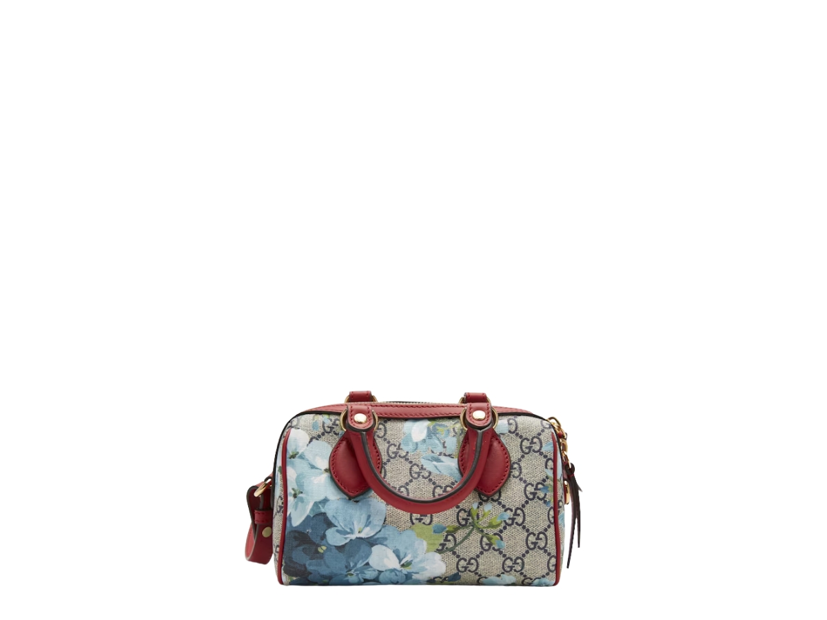 https://d2cva83hdk3bwc.cloudfront.net/gc-habbgmthbigthwbbb-gucci-mini-top-handle-bag-in-gold-tone-hardware-with-blue-blooms-beige-2.jpg