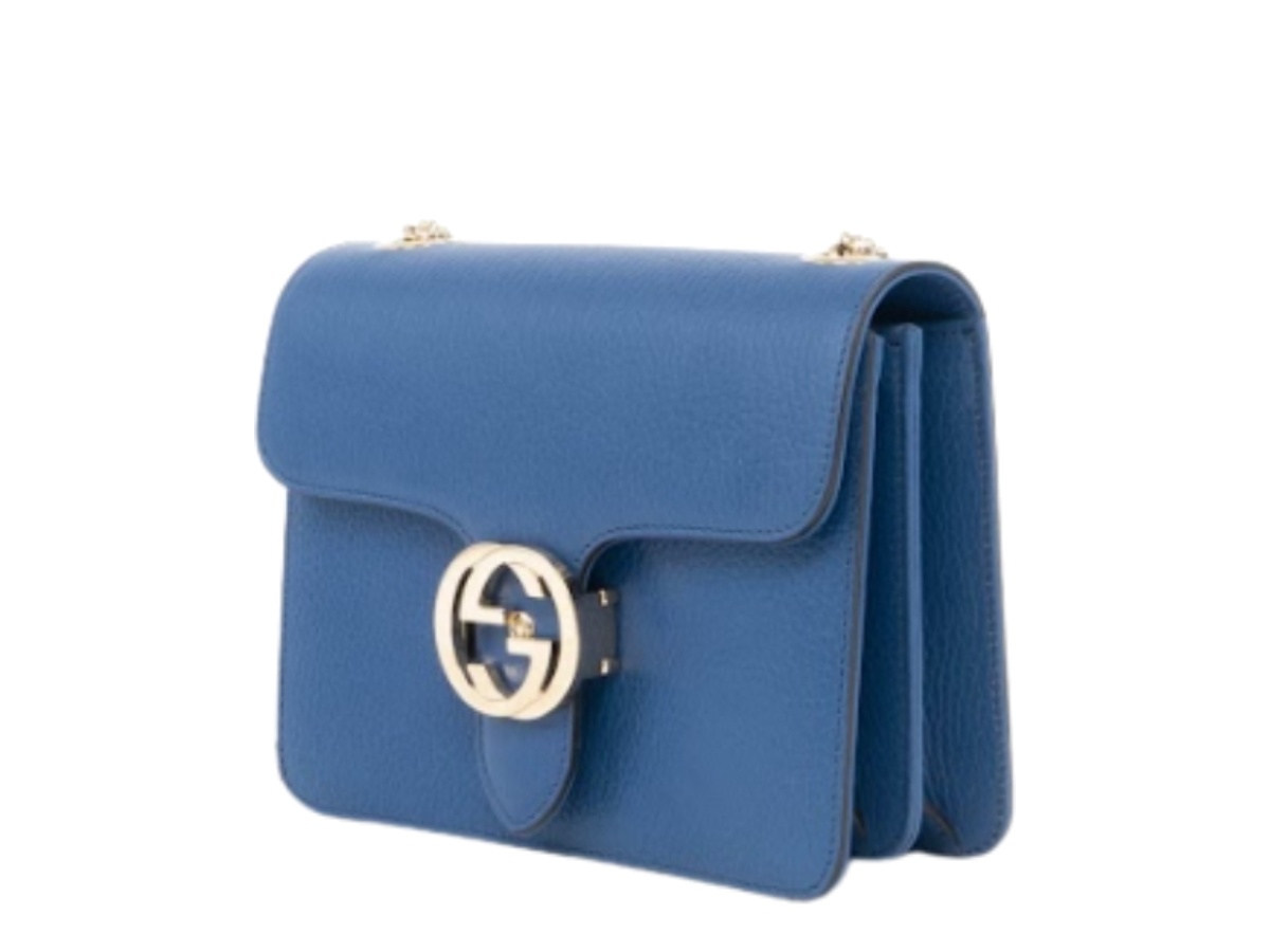 https://d2cva83hdk3bwc.cloudfront.net/gc-sbbgigpiblwstb-gucci-interlocking-g-plaque-in-blue-leather-with-silver-tone-blue-2.jpg