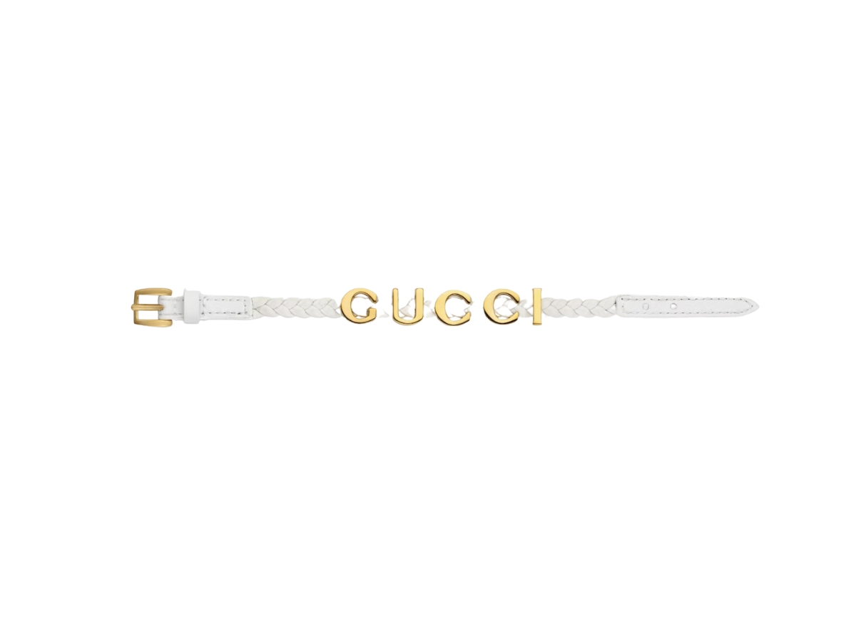 https://d2cva83hdk3bwc.cloudfront.net/gucci--gucci--bracelet-in-white-leather-with-gold-metal-hardware-3.jpg