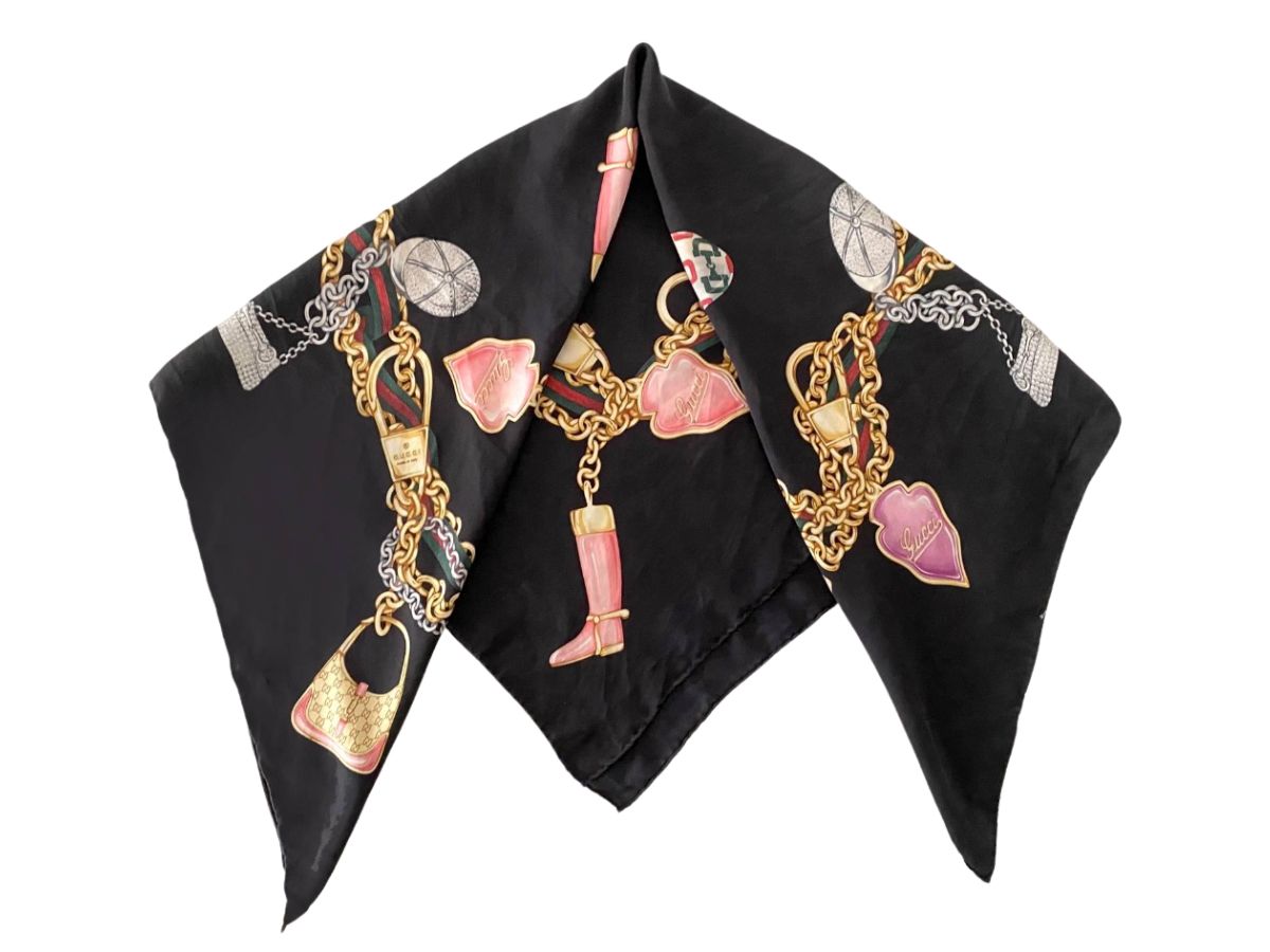 https://d2cva83hdk3bwc.cloudfront.net/gucci-black-bag-charms-boots-and-chain-print-silk-scarf-2000s-2.jpg