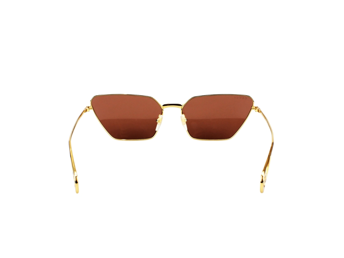 https://d2cva83hdk3bwc.cloudfront.net/gucci-cat-eye-sunglasses-in-gold-metal-with-orange-lens-4.jpg