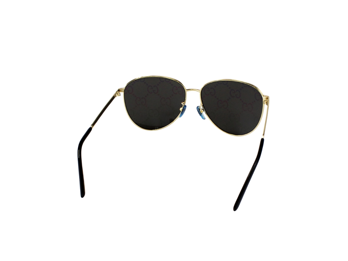 https://d2cva83hdk3bwc.cloudfront.net/gucci-eyewear-round-frame-sunglasses-in-gold-metal-with-dark-greygg-lens-4.jpg