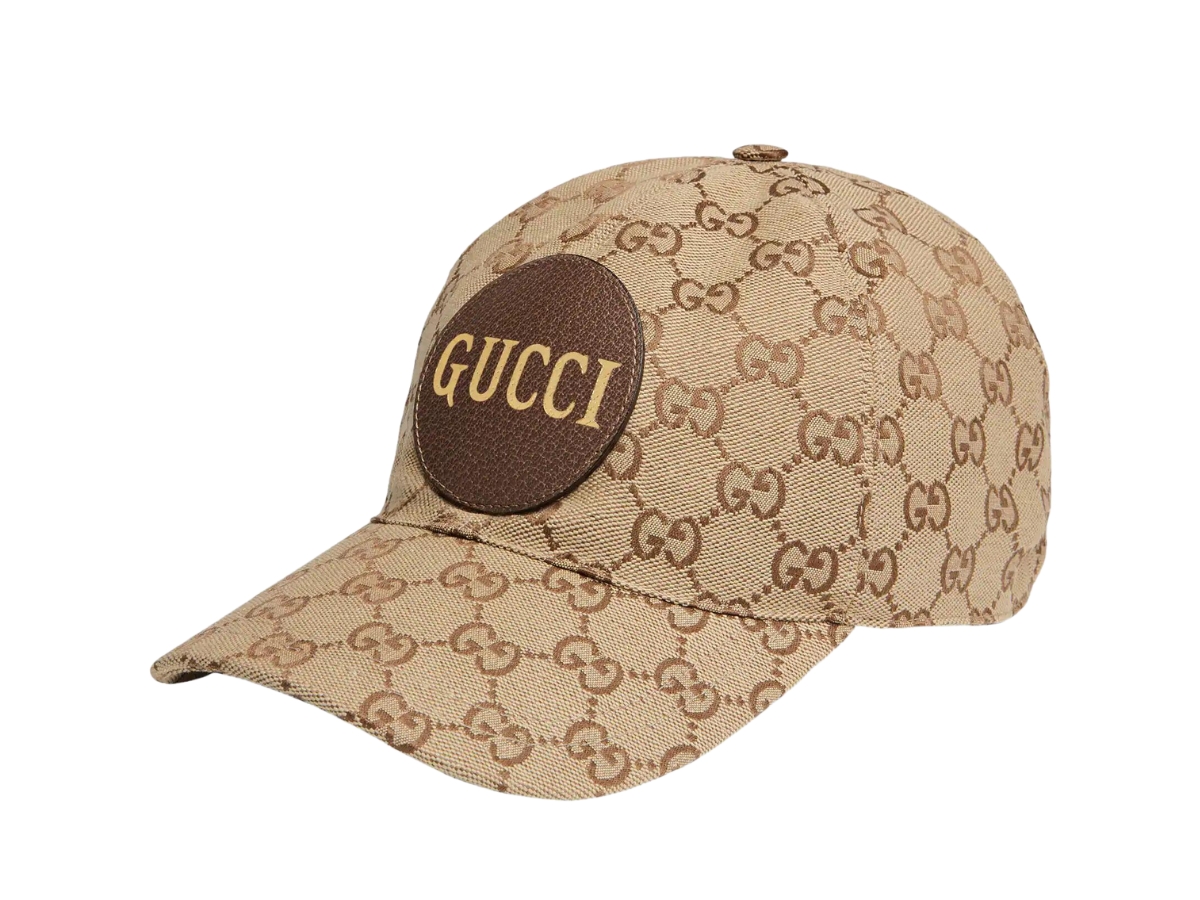 https://d2cva83hdk3bwc.cloudfront.net/gucci-gg-canvas-baseball-hat-in-beige-brown-canvas-and-leather-detail-with-gucci-script-logo-1.jpg