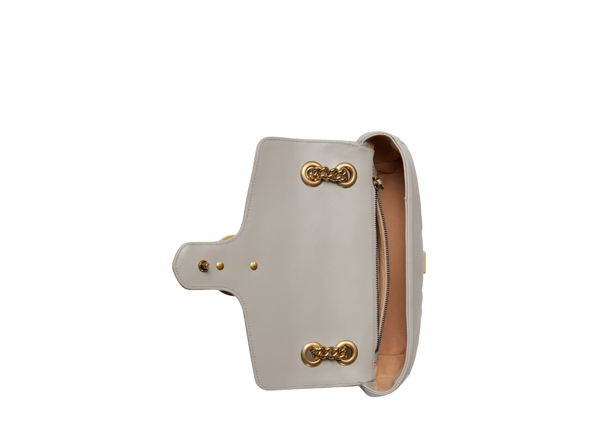 https://d2cva83hdk3bwc.cloudfront.net/gucci-gg-marmont-small-shoulder-bag-flap-in-light-grey-matelass--chevron-leather-with-antique-gold-toned-hardware-4.jpg
