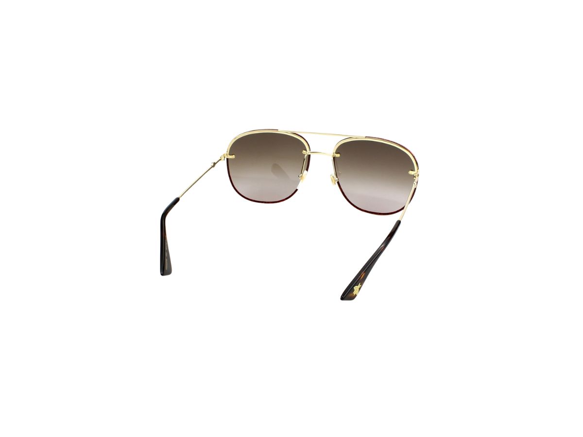 https://d2cva83hdk3bwc.cloudfront.net/gucci-gg0227s-sunglasses-in-gold-metal-plastic-frame-with-grey-black-lens-4.jpg
