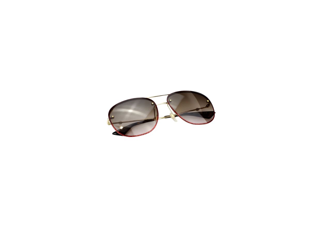 https://d2cva83hdk3bwc.cloudfront.net/gucci-gg0227s-sunglasses-in-gold-metal-plastic-frame-with-grey-black-lens-6.jpg