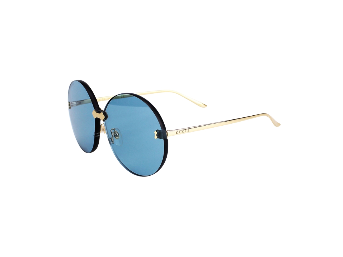 https://d2cva83hdk3bwc.cloudfront.net/gucci-gg0353s-sunglasses-in-gold-metal-with-blue-lens-5.jpg