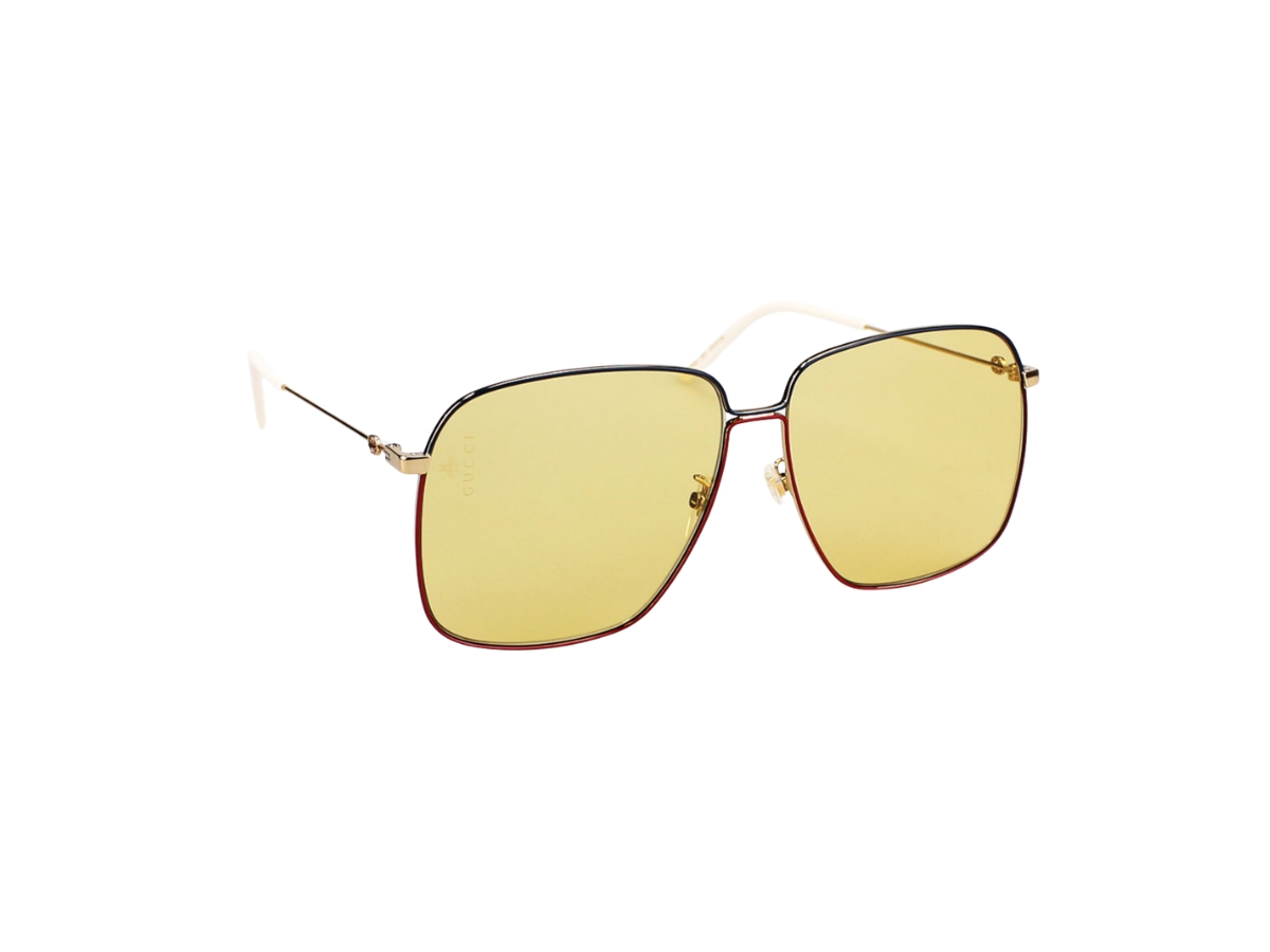 https://d2cva83hdk3bwc.cloudfront.net/gucci-gg0394s-sunglasses-in-gold-metal-and-plastic-with-yellow-lens-3.jpg