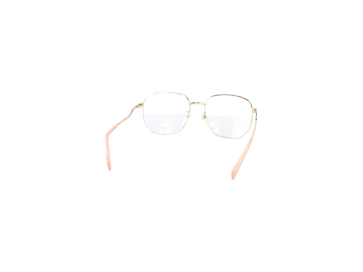 https://d2cva83hdk3bwc.cloudfront.net/gucci-gg0973o-glasses-in-gold-metal-frame-with-demo-lens-4.jpg