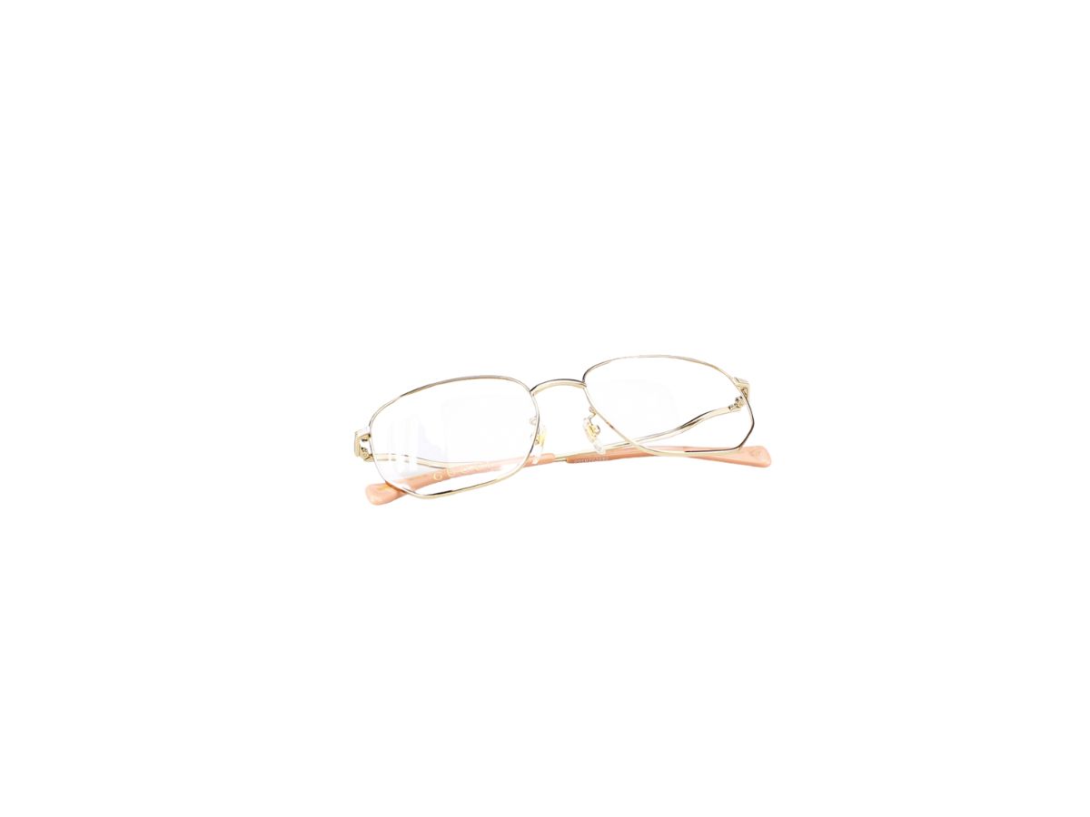 https://d2cva83hdk3bwc.cloudfront.net/gucci-gg0973o-glasses-in-gold-metal-frame-with-demo-lens-6.jpg
