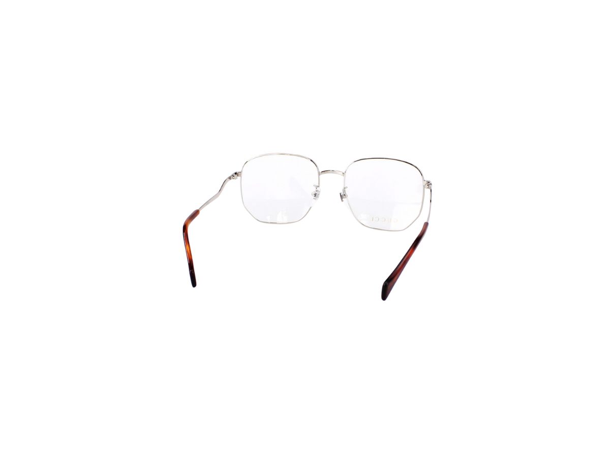 https://d2cva83hdk3bwc.cloudfront.net/gucci-gg0973o-glasses-in-silver-metal-frame-with-demo-lens-4.jpg