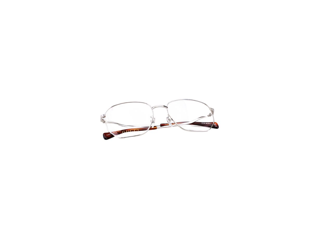 https://d2cva83hdk3bwc.cloudfront.net/gucci-gg0973o-glasses-in-silver-metal-frame-with-demo-lens-6.jpg