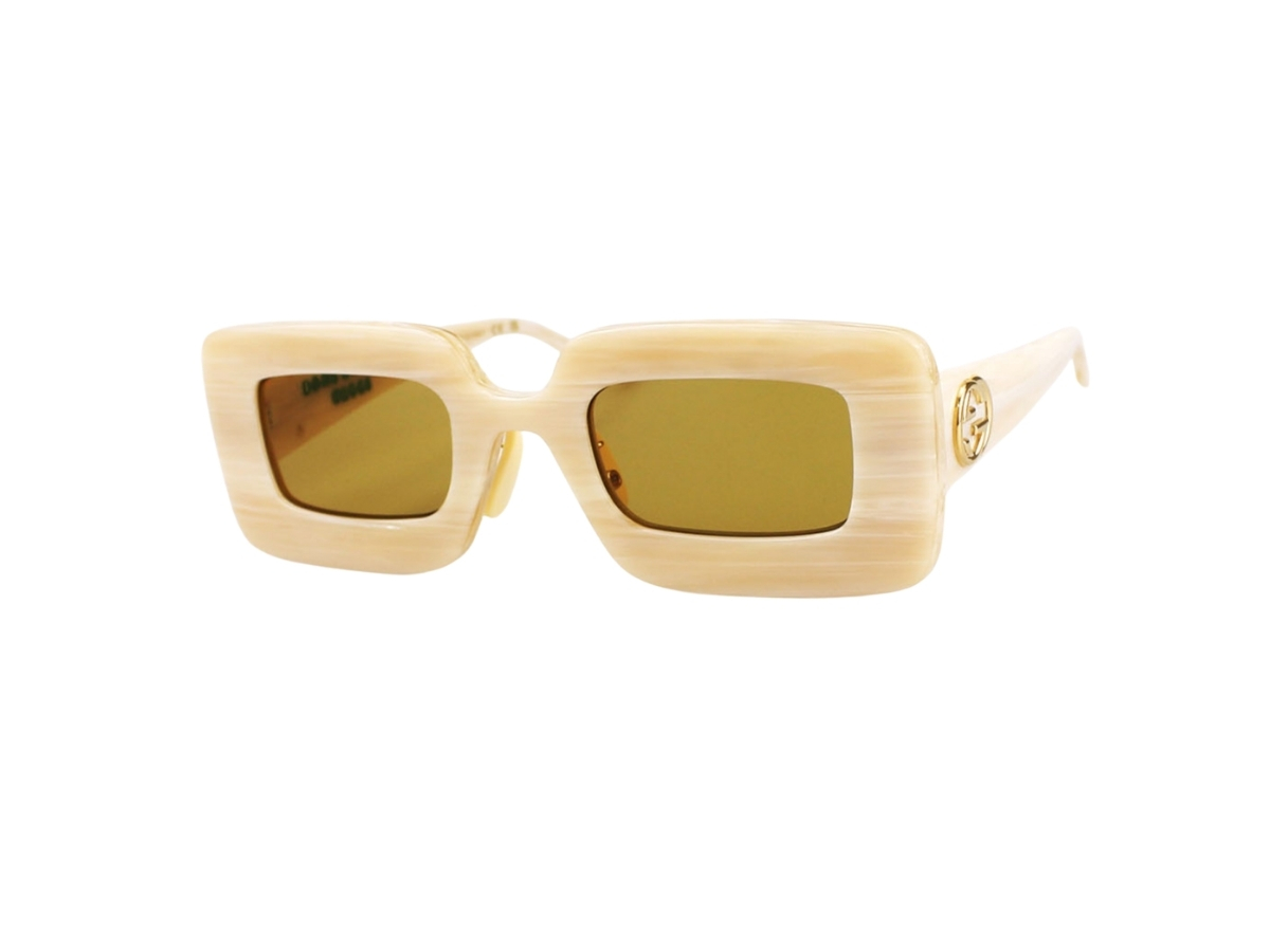 https://d2cva83hdk3bwc.cloudfront.net/gucci-gg0974s-002-49-sunglasses-in-ivory-acetate-frame-gold-interlocking-g-with-yellow-lenses-1.jpg