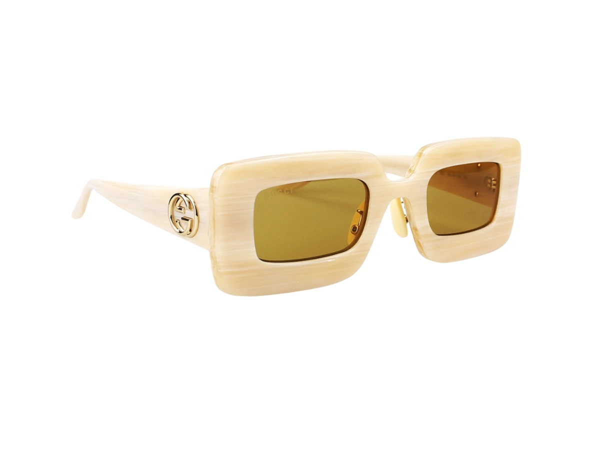 https://d2cva83hdk3bwc.cloudfront.net/gucci-gg0974s-002-49-sunglasses-in-ivory-acetate-frame-gold-interlocking-g-with-yellow-lenses-3.jpg
