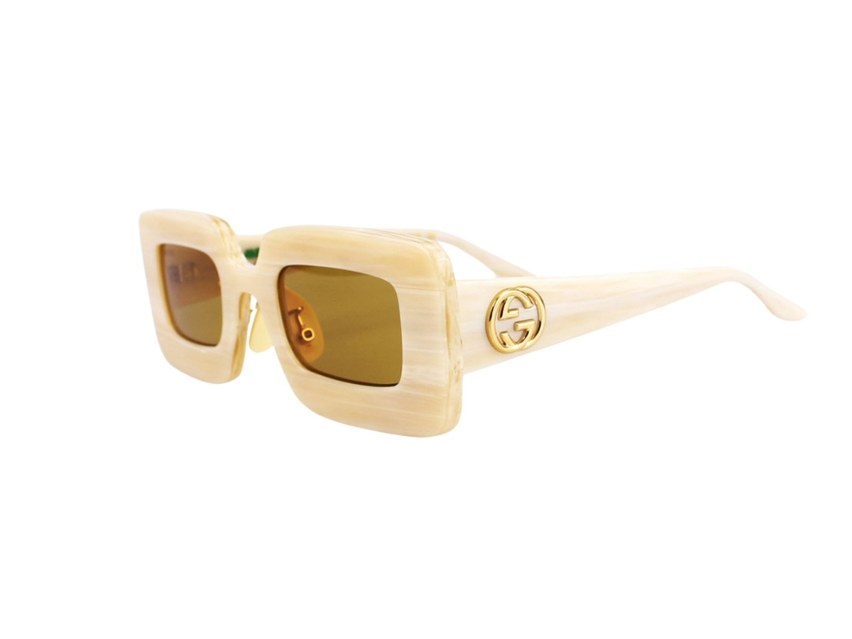 https://d2cva83hdk3bwc.cloudfront.net/gucci-gg0974s-002-49-sunglasses-in-ivory-acetate-frame-gold-interlocking-g-with-yellow-lenses-5.jpg