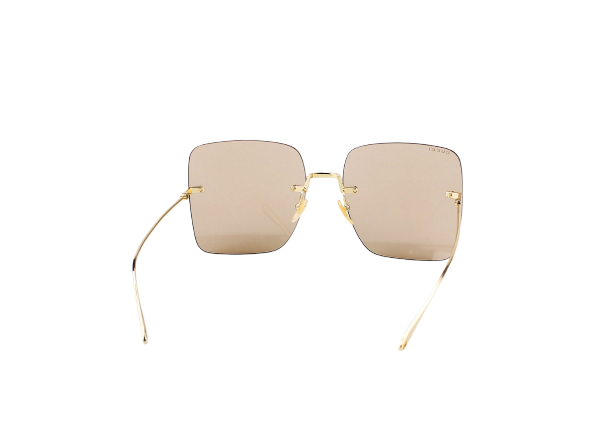 https://d2cva83hdk3bwc.cloudfront.net/gucci-gg1147s-sunglasses-in-gold-metal-with-brown-lens-4.jpg