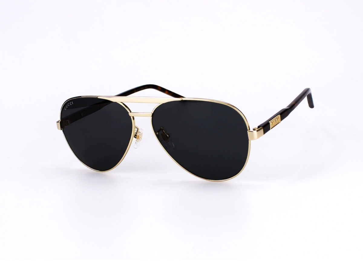 https://d2cva83hdk3bwc.cloudfront.net/gucci-gg1163s-001-60-sunglasses-in-gold-metal-frame-havana-with-grey-lenses-1.jpg